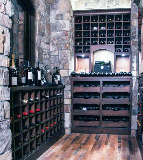 wine cellar with drawers, shelves for display and holding slots